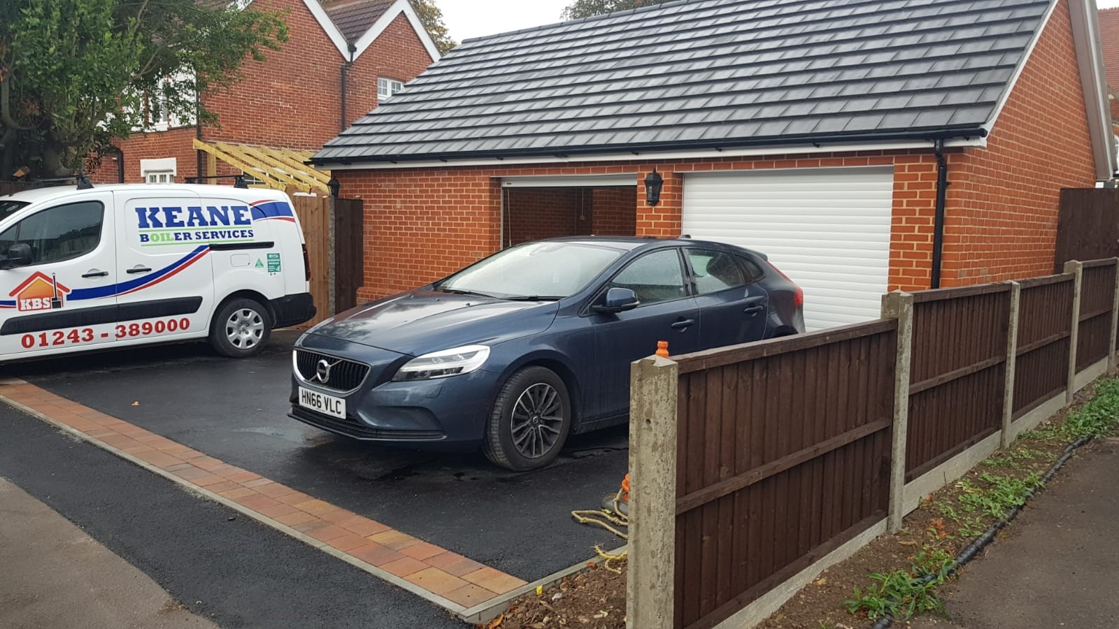 double garage built using red bricks